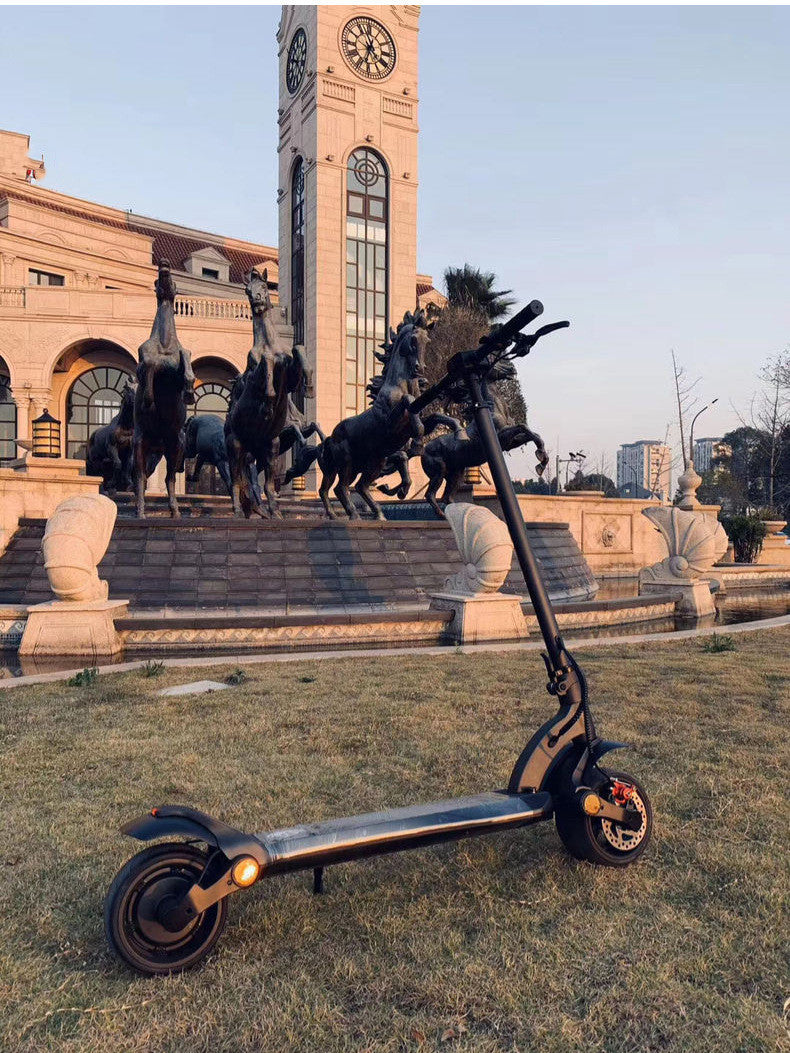 High-Performance Electric Scooter with 9-Inch Wide Tires - 36V Dual Drive Folding Design