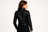 Model wearing classic black jacket - back view